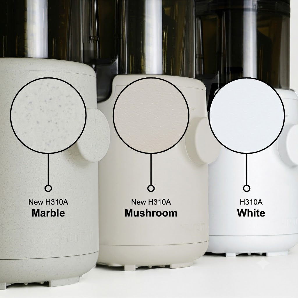 Hurom_H310A_Unterschied.jpg zeigt drei Entsafter in den Farb- und Texturvarianten Marble, Mushroom und White.